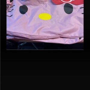 Sanrio Hello Kitty Pink Bag with Red Bow and Yellow Nose and other things